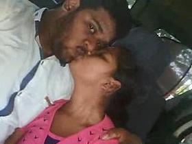 Desi couple engages in passionate kissing and blowjob in a car