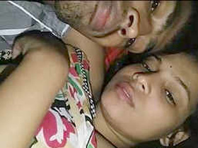 Cute Indian lover gives passionate kisses and boob sucking