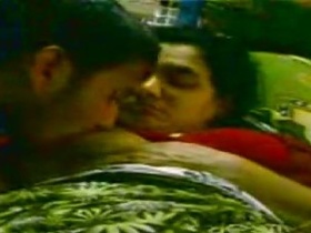 Mom hoseur gives a blowjob to her son in a Tamil sex video