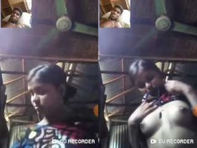 Exclusive video of a cute Indian girl masturbating with her boobs