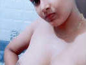 Indian babe Maal takes a bath in the bathroom