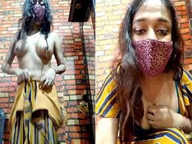 Amateur Indian girl performs striptease for camera