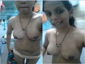 Exclusive video of a cute Desi girl showing off her tits and pussy