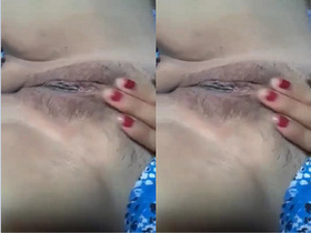 Indian bhabhi's exclusive play with her pussy on camera