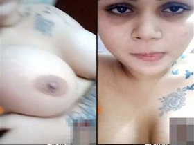 Exclusive video of a stunning Indian girl flaunting her big boobs and pussy