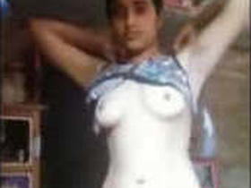 Indian teenager gets naughty in a striptease performance