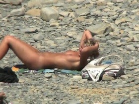 A compilation of beach porn featuring nudist orgies