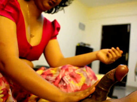 Indian wife gives her husband a handjob in a steamy video