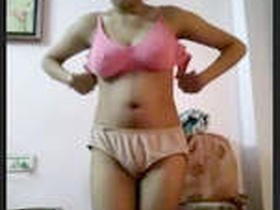 A young girl revealing her hairy pussy in a video