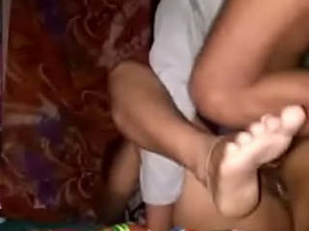 Desi aunty and young boy engage in sexual activity
