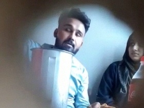 Desi couple caught on hidden camera in a restaurant, Mallu girlfriend gives her boyfriend a titjob