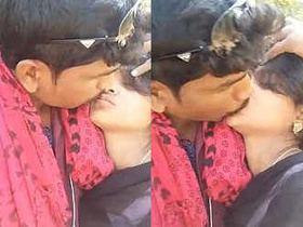 Outdoor kissing session between Indian lovers