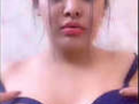 Indian bhabhi shows off her breasts on live TV
