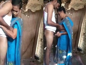Randi, a mature south Indian woman, indulges in intimate moments with a customer