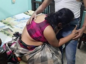 A hot Indian bhabhi gets naughty in a sari and takes a hard cock