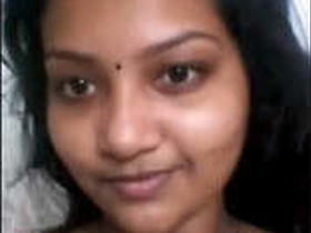 Cute Tamil amateur girl goes nude on camera