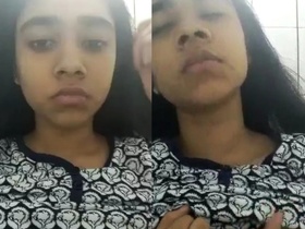 Girlfriend flaunts her breasts for the camera