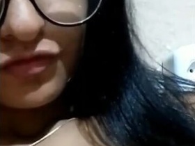 A beautiful woman flaunts her large breasts