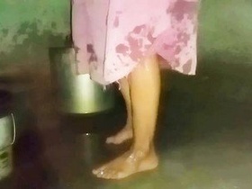 Indian aunty enjoying bathing in her home