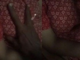 Mature woman's big tits and pussy exposed in explicit video