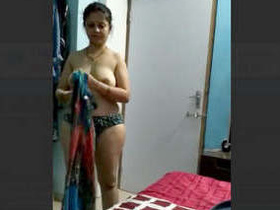 Hubby secretly records his wife naked in intimate video