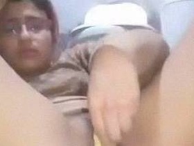 Indian girl pleasures herself with a dildo and banana