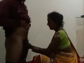 Desi Aunty Randi Gives a Handjob and Gets Fucked