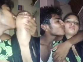 Desi guy squeezes and kisses his cousin's breasts in a steamy video