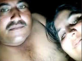 Mature couple in the village at night