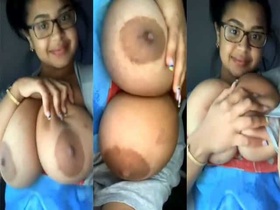 Busty babe with big natural boobs in MMS video