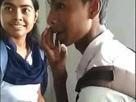 Desi college student shares a passionate kiss with her partner