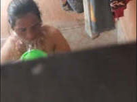 Depressed aunty masturbates in the bathtub, frustrated by her lack of satisfaction