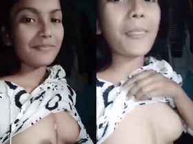 Young girl flaunts her perky breasts in amateur video