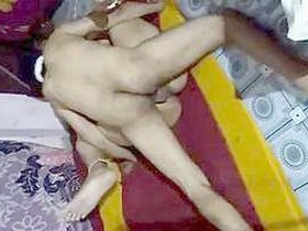 Horny Indian aunt satisfies her husband's desires