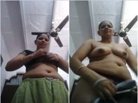 Desi bhabhi's exclusive strip show with saree and big tits