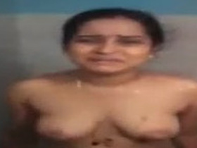 Indian bhabhi bathes and dresses in telugu video