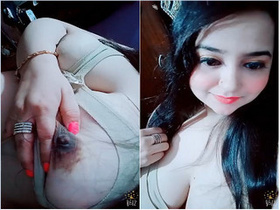 Exclusive video of a cute Indian college girl flaunting her big boobs