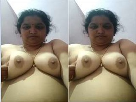 Exclusive amateur video of a bhabhi stripping and showing off her boobs
