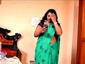 Indian aunty gets hot and heavy with her neighbor in this steamy video