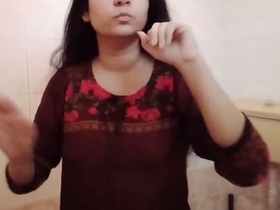 Busty desi bhabhi undresses and takes nude selfies in the bathroom