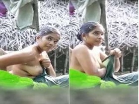 Hidden camera captures bhabhi's outdoor bathing and boobs