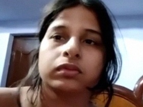 Sexy Bengali girl strips down and captures her nude body on video