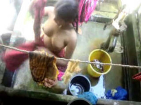 Two Indian sisters indulge in a steamy bathing session