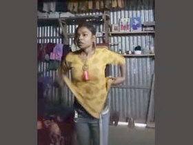 Indian girl in a village changing clothes